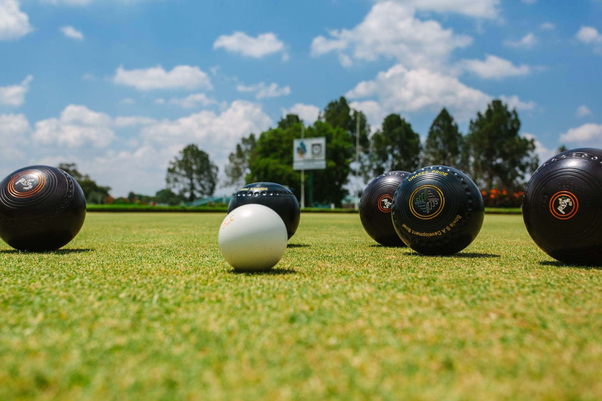 Bowls on a bowling green at The Lake Club Benoni